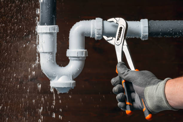 Professional Drain Cleaning technician working in Cascade, IA